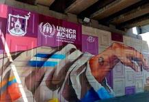 Inauguran mural de apoyo a migrantes
