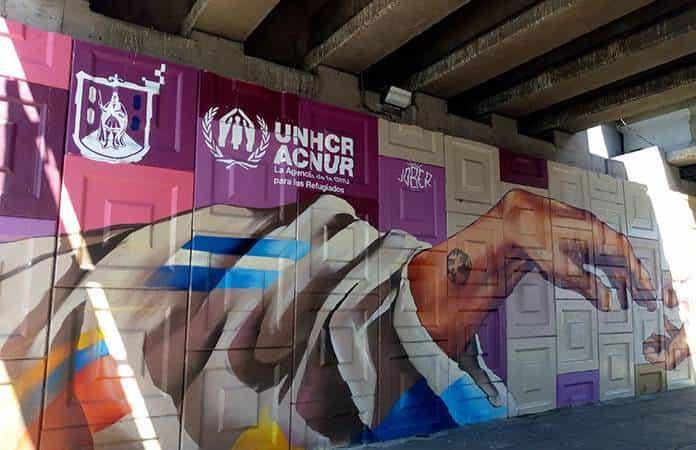 Inauguran mural en Salvador Nava dedicado a la solidaridad con personas refugiadas
